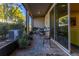 Relaxing screened porch with paver patio and seating area at 5805 Grand Sonata Ave, Lutz, FL 33558