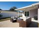 Relaxing patio furniture on a spacious backyard patio at 5808 Dartmouth N Ave, St Petersburg, FL 33710