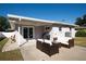 Backyard patio with seating area and covered lanai at 5808 Dartmouth N Ave, St Petersburg, FL 33710