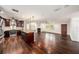 Modern kitchen with granite countertops and dark cabinets at 5857 25Th S St, St Petersburg, FL 33712