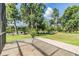 Relaxing patio overlooking a tranquil lake at 730 June Lake Ln, Brandon, FL 33510