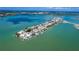 Wide aerial view of waterfront community at 817 Bay Point Dr, Madeira Beach, FL 33708