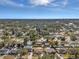 Aerial view of a residential neighborhood with single-Gathering homes and lush landscaping at 9126 109Th Ter, Seminole, FL 33777