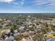 Drone view of the property and surrounding community, showcasing location and proximity to amenities at 9126 109Th Ter, Seminole, FL 33777