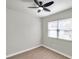 Well-lit bedroom featuring wood-look floors and a window with blinds at 9126 109Th Ter, Seminole, FL 33777