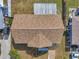 Top-down view of a house roof with brown shingles at 9126 109Th Ter, Seminole, FL 33777