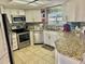 Modern kitchen with stainless steel appliances and granite countertops at 9790 66Th N St # 428, Pinellas Park, FL 33782