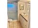 Clean bathroom with shower, toilet and vanity with grey countertop at 9790 66Th N St # 74, Pinellas Park, FL 33782