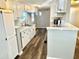 Modern kitchen with white cabinets and granite countertops at 9790 66Th N St # 74, Pinellas Park, FL 33782