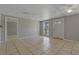 Bright living room with tile floors and neutral walls at 1025 Fairwood Ave, Clearwater, FL 33759