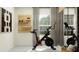 Home gym with an exercise bike and large mirrors at 11331 E 65Th Ter, Palmetto, FL 34221