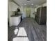 Open concept kitchen with modern finishes and ample cabinet space at 1302 E Annie St, Tampa, FL 33612