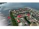 Aerial view of waterfront community with private boat docks, canals, and waterfront homes at 1414 Alhambra Dr, Apollo Beach, FL 33572