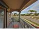 Balcony featuring a chair, a small table, and community views, perfect for relaxation at 1414 Alhambra Dr, Apollo Beach, FL 33572