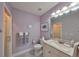 Elegant bathroom showcases a vanity with sink and a glass-enclosed shower for a modern touch at 1414 Alhambra Dr, Apollo Beach, FL 33572