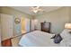 Comfortable bedroom featuring a ceiling fan and an ensuite bathroom for added convenience at 1414 Alhambra Dr, Apollo Beach, FL 33572