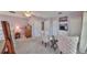 Charming bedroom featuring sitting area, soft lighting, and a beautiful neutral color scheme at 1414 Alhambra Dr, Apollo Beach, FL 33572