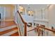 Second floor foyer overlooking the dining room and main living spaces at 1414 Alhambra Dr, Apollo Beach, FL 33572