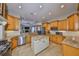 Spacious eat-in kitchen with granite countertops and stainless steel appliances at 1414 Alhambra Dr, Apollo Beach, FL 33572