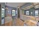 Bright main bathroom with a soaking tub, walk-in shower, and dual sinks at 1414 Alhambra Dr, Apollo Beach, FL 33572
