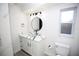 Modern bathroom with glass vessel sink and marble countertop at 1502 Cherrywood Ave, Tampa, FL 33613