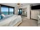 Main bedroom with ocean view and mirrored closet doors at 1660 Gulf Blvd # 803, Clearwater Beach, FL 33767