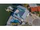 Bird's-eye view of waterfront home, pool, and dock at 17410 1St E St, Redington Shores, FL 33708