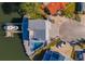 Top-down view of house, dock, and circular driveway at 17410 1St E St, Redington Shores, FL 33708