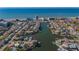 Aerial view showcasing home's waterfront location at 17410 1St E St, Redington Shores, FL 33708
