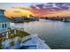 Stunning waterfront property at sunset at 17410 1St E St, Redington Shores, FL 33708