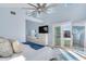 Main bedroom with private balcony and city views at 17410 1St E St, Redington Shores, FL 33708