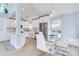 Bright dining area with glass table and white chairs at 17410 1St E St, Redington Shores, FL 33708