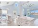 Open concept dining area with water views and kitchen access at 17410 1St E St, Redington Shores, FL 33708