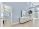 Bright hallway with access to upper floor and bedroom at 17410 1St E St, Redington Shores, FL 33708