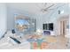 Bright living room with water views and large sectional sofa at 17410 1St E St, Redington Shores, FL 33708