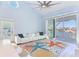 Open concept living room with water views and modern decor at 17410 1St E St, Redington Shores, FL 33708
