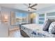 Main bedroom with water views and sliding door closet at 17410 1St E St, Redington Shores, FL 33708