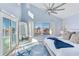 Bright bedroom with water views and a large bed at 17410 1St E St, Redington Shores, FL 33708