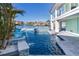 Luxury pool and spa with water features at 17410 1St E St, Redington Shores, FL 33708