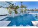 Stunning blue pool with multiple water features at 17410 1St E St, Redington Shores, FL 33708