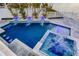 Luxury pool and spa with water features at 17410 1St E St, Redington Shores, FL 33708