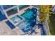 Elevated spa and rectangular pool with water features at 17410 1St E St, Redington Shores, FL 33708