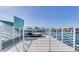 Relaxing rooftop deck with water views and comfortable seating at 17410 1St E St, Redington Shores, FL 33708