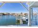 Deck with spiral stairs and waterfront views at 17410 1St E St, Redington Shores, FL 33708