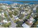 Aerial view showing home's location in a residential neighborhood near the water at 1919 Shore Acres Ne Blvd, St Petersburg, FL 33703