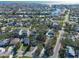 Aerial view of home and neighborhood, showcasing location near water at 1919 Shore Acres Ne Blvd, St Petersburg, FL 33703