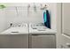 Laundry room with washer and dryer at 20388 Lagente Cir, Venice, FL 34293