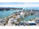 Aerial view of waterfront home with boat access and expansive city views at 326 129Th E Ave, Madeira Beach, FL 33708