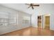 Bright bedroom with hardwood floors and ample natural light at 3610 Pine Knot Dr, Valrico, FL 33596