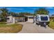 Modern home with attached garage and RV parking at 402 161St Ave, Redington Beach, FL 33708